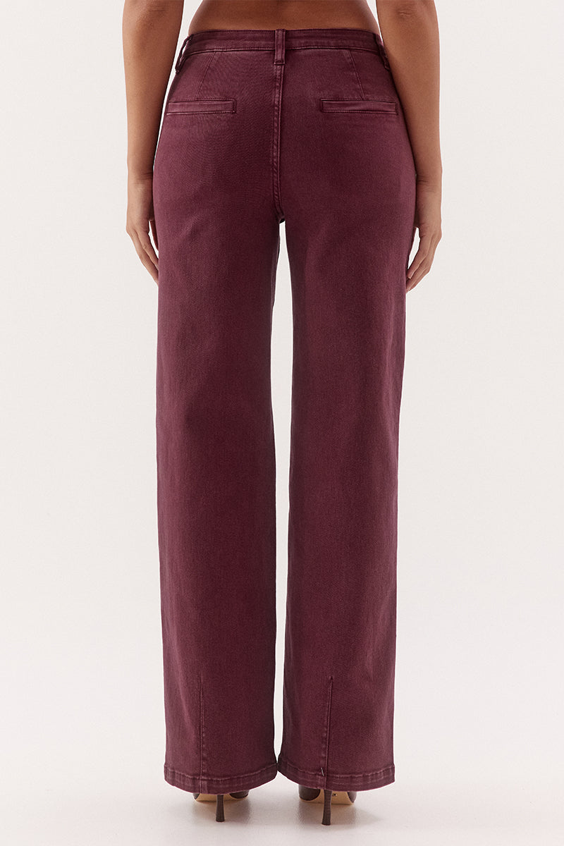 Women's mid-rise straight leg jeans in cotton blend denim with functional front and back pockets, fly-front closure, and tailored hem darts.