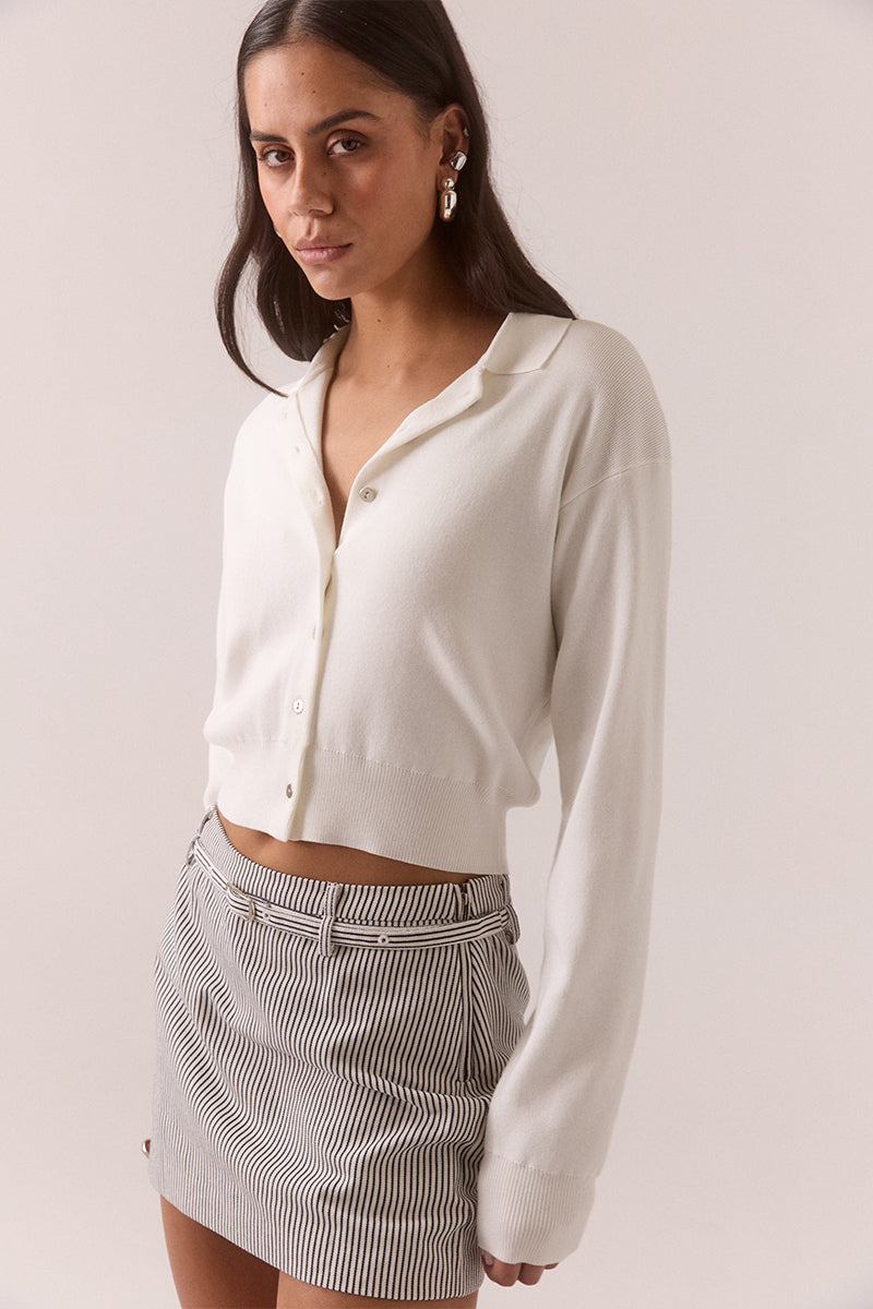 Fully fashioned long sleeve knit top with collared neckline and button-front closure