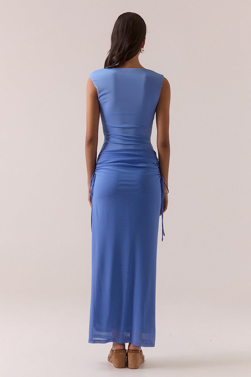 Model wearing dropped waist maxi dress with wide square neckline, stretch bodice, adjustable hip drawstring, fully lined mesh skirt, and elongating pull-on silhouette.