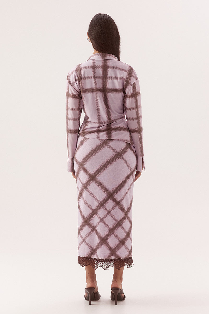Women's textured stretch mesh drape front shirt with exclusive print, cowl wrap neckline, dropped shoulders and wide split cuffs.
