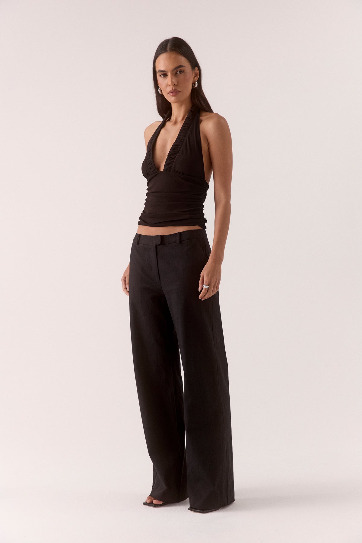 Women’s textured stretch mesh empire halter neck top with gathered side detailing, back neck tie, elasticated back and flattering fitted silhouette.