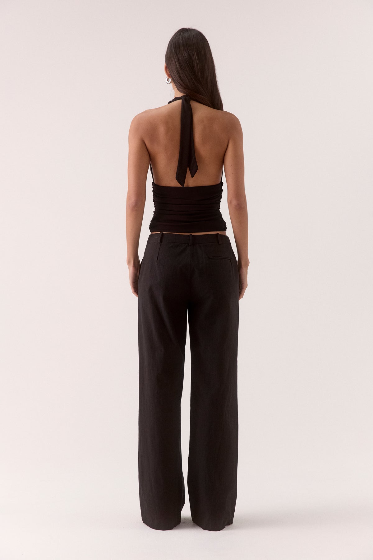 Women’s textured stretch mesh empire halter neck top with gathered side detailing, back neck tie, elasticated back and flattering fitted silhouette.
