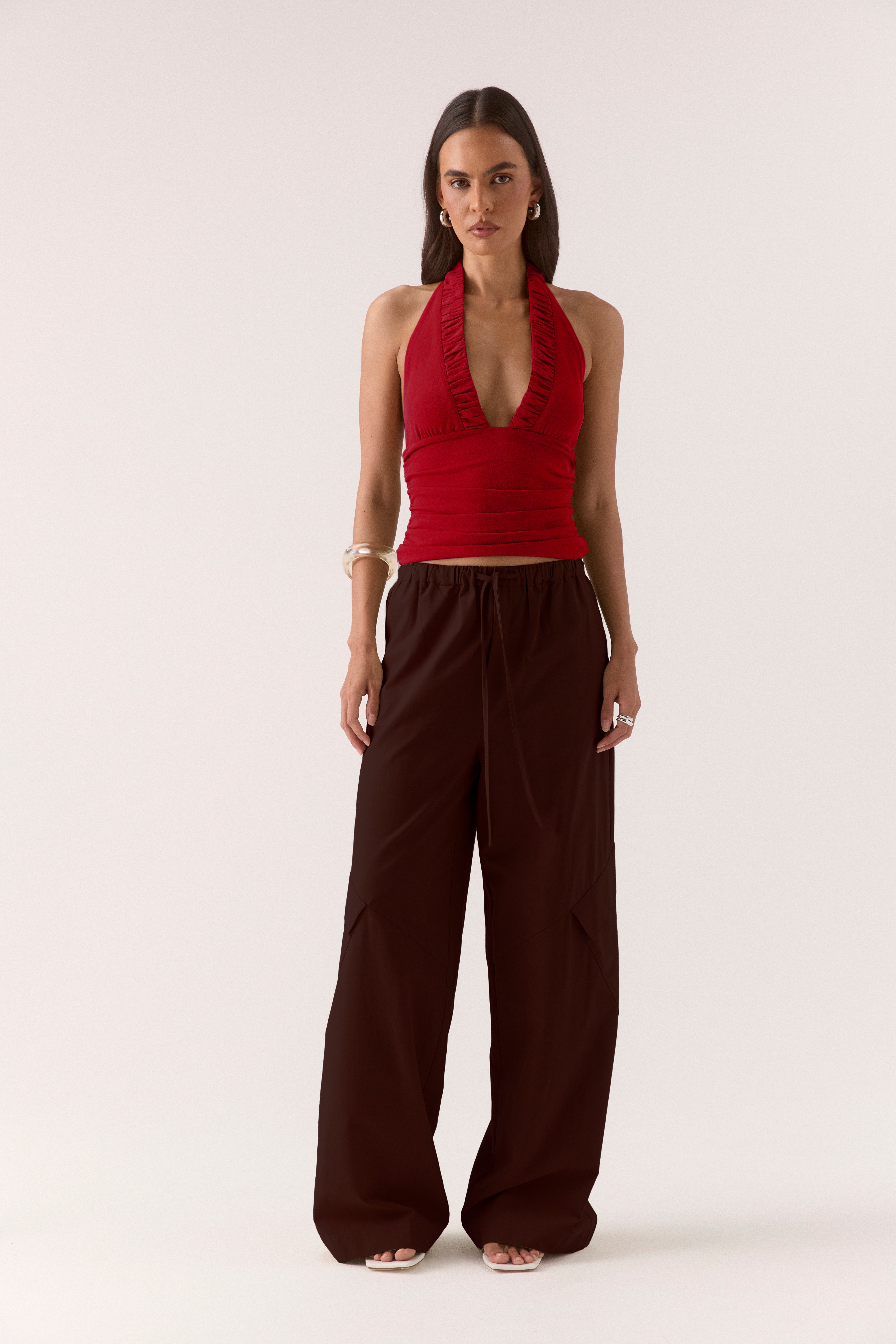 Women’s textured stretch mesh empire halter neck top with gathered side detailing, back neck tie, elasticated back and flattering fitted silhouette.