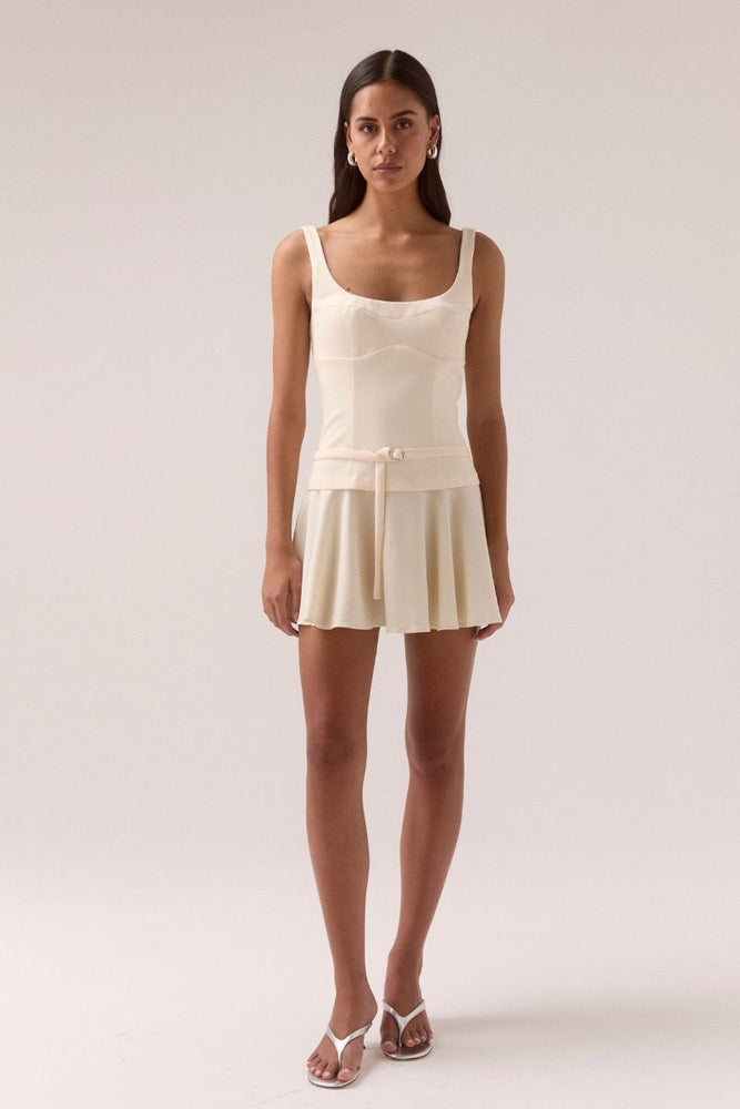 - Viscose blend bodice &amp; Lyocell skirt fabrication
- Sleevless mini dress
- Fixed strap
- Scooped neckline
- Shaped underbust seam
- Main fabric belt with sIlver metal slider&nbsp;
- Invisible zipper at back&nbsp;
- Body shaping panels
- Dropped waist seam
- Soft gathers through skirt
- Bodice is only lined