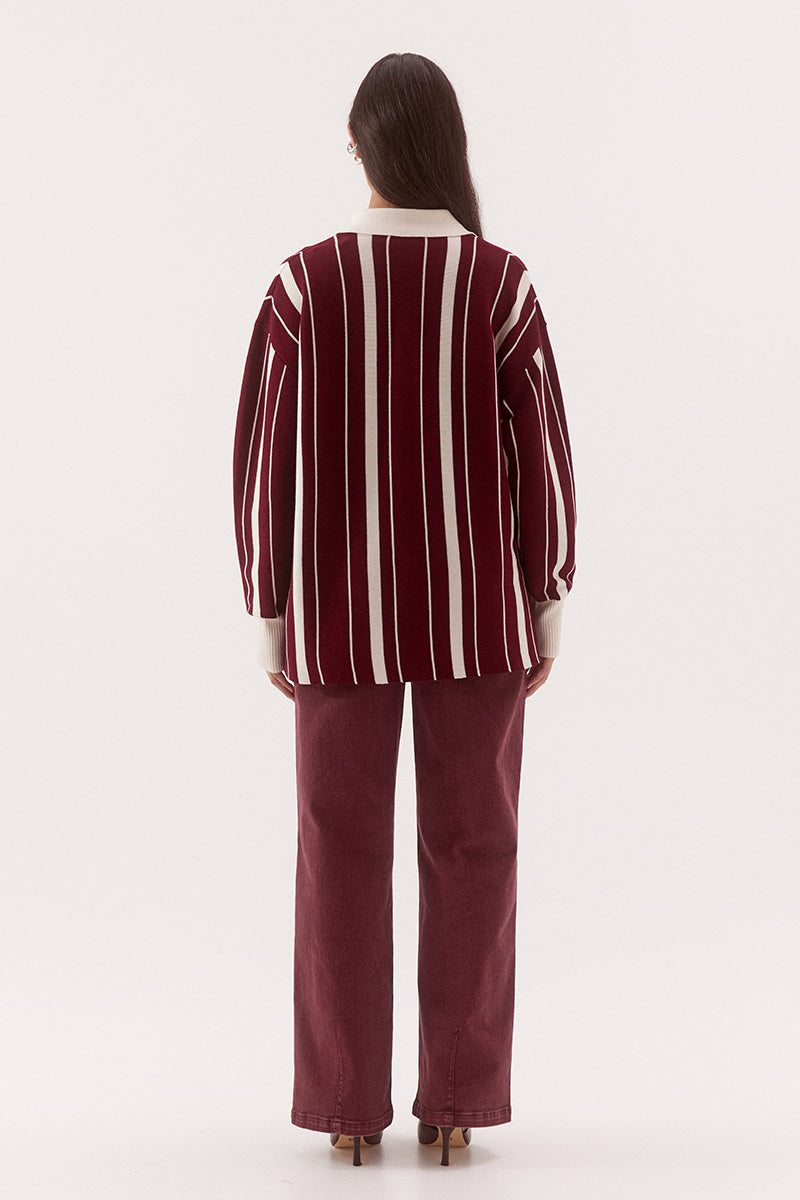 Women’s oversized knit sweater with multicolour stripe design, collar with button placket, dropped shoulders and ribbed cuffs, hem and trims